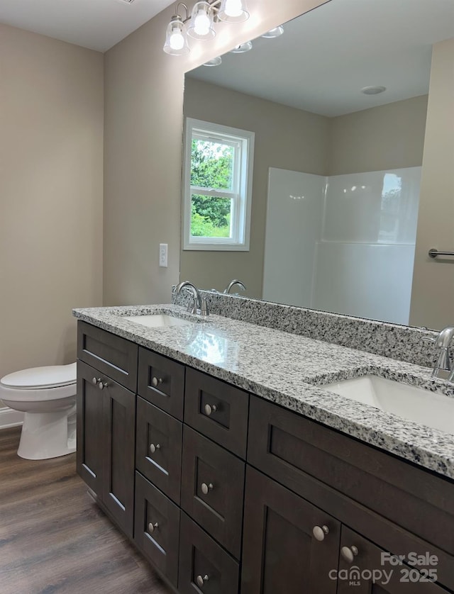 32967 Poplar Lane Rd, Albemarle, NC 28001 - bathroom with double vanity, wood finished floors, and a shower