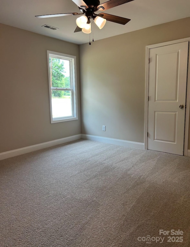 32967 Poplar Lane Rd, Albemarle, NC 28001 - unfurnished room with carpet floors and a ceiling fan