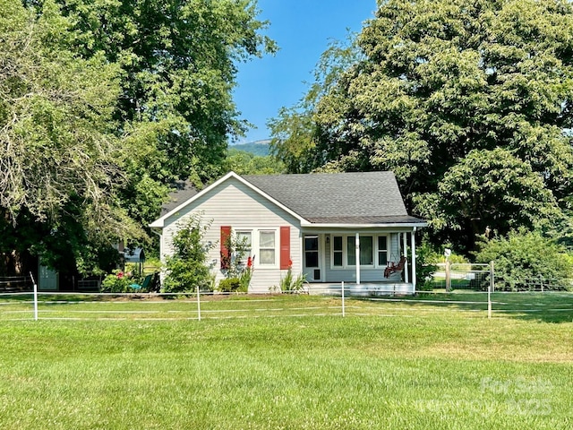 39 Hemphill Rd, Waynesville, NC 28785 - ranch-style home with covered porch and roof with shingles