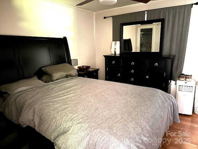 39 Hemphill Rd, Waynesville, NC 28785 - bedroom with wood finished floors and ornamental molding