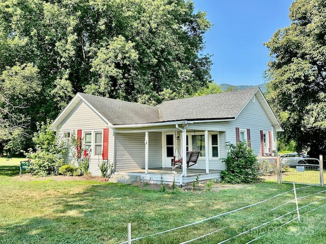 39 Hemphill Rd, Waynesville, NC 28785 - ranch-style home with covered porch and roof with shingles