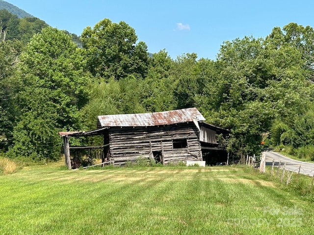 39 Hemphill Rd, Waynesville, NC 28785 - view of outdoor structure with a forest view
