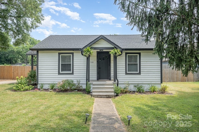700 Perkins St, Lowell, NC 28098 - view of front facade with roof with shingles