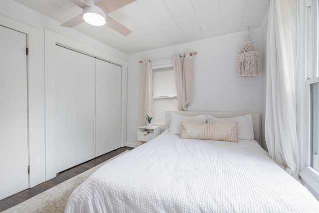 700 Perkins St, Lowell, NC 28098 - bedroom with wood finished floors, a closet, and ceiling fan