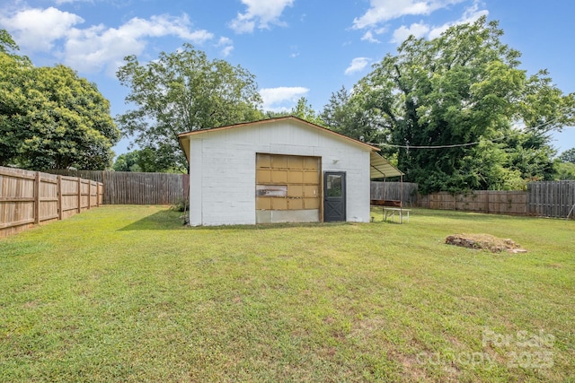 700 Perkins St, Lowell, NC 28098 - view of shed featuring a fenced backyard