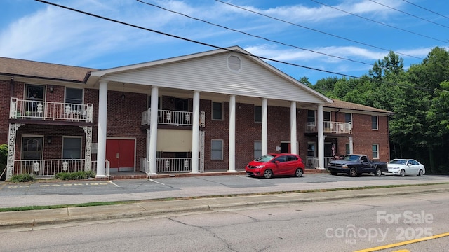 2116 S Main St, Kannapolis, NC 28081 - view of building exterior with uncovered parking