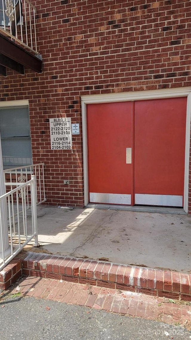 2116 S Main St, Kannapolis, NC 28081 - view of exterior entry featuring brick siding