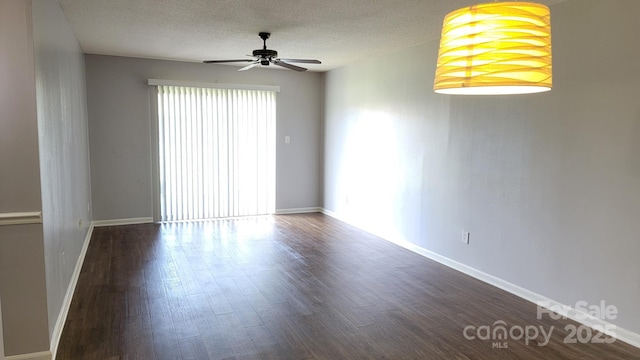 2116 S Main St, Kannapolis, NC 28081 - empty room featuring ceiling fan, wood finished floors, and a textured ceiling
