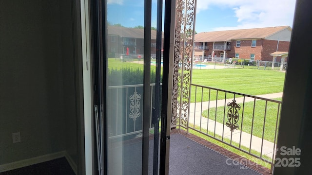 2116 S Main St, Kannapolis, NC 28081 - doorway to outside with plenty of natural light and carpet