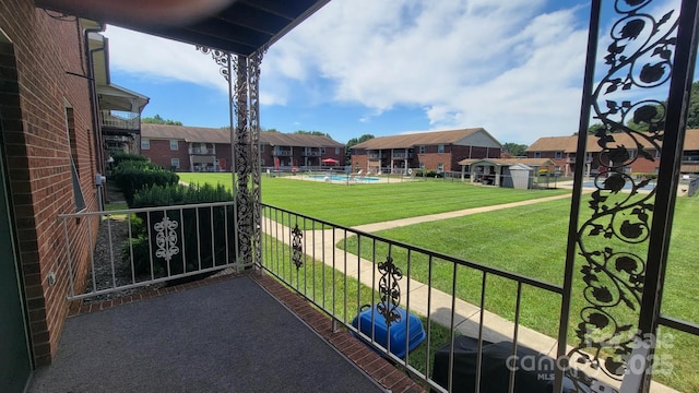 2116 S Main St, Kannapolis, NC 28081 - balcony featuring view of pool area and a residential view