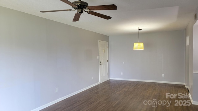 2116 S Main St, Kannapolis, NC 28081 - unfurnished room with dark wood-style floors and a ceiling fan