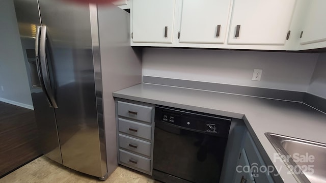 2116 S Main St, Kannapolis, NC 28081 - kitchen with stainless steel fridge, dishwasher, and white cabinets