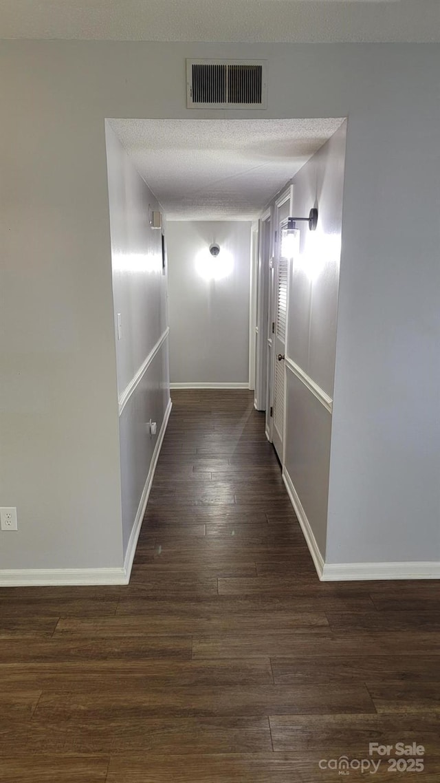 2116 S Main St, Kannapolis, NC 28081 - corridor featuring wood finished floors and a textured ceiling