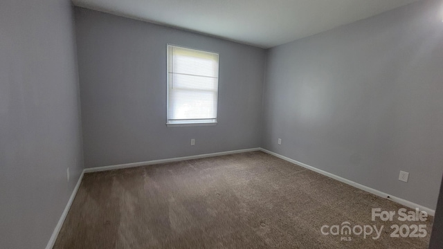 2116 S Main St, Kannapolis, NC 28081 - carpeted spare room with baseboards