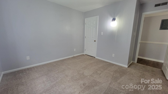 2116 S Main St, Kannapolis, NC 28081 - unfurnished bedroom featuring carpet and electric panel