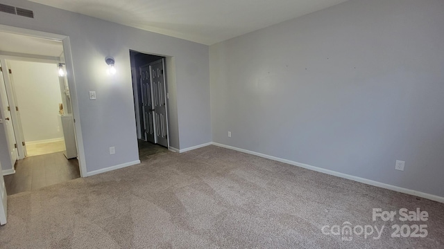 2116 S Main St, Kannapolis, NC 28081 - unfurnished bedroom with carpet and baseboards