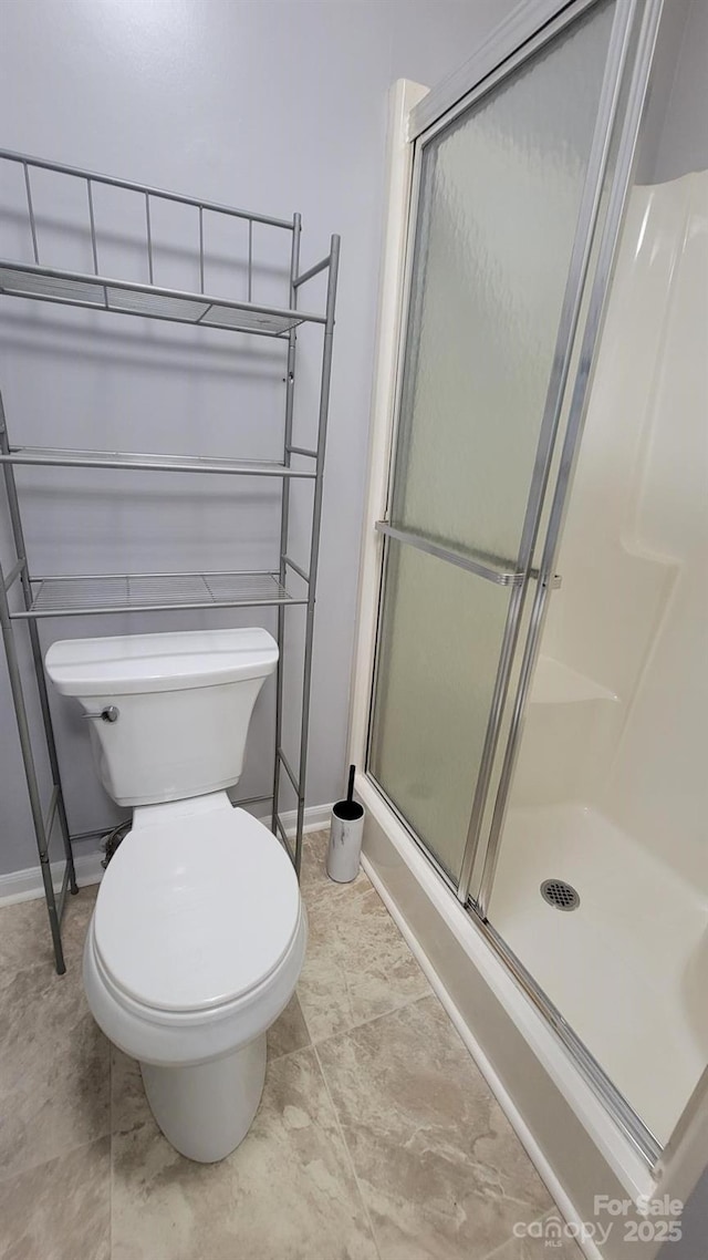 2116 S Main St, Kannapolis, NC 28081 - full bath featuring baseboards and a stall shower