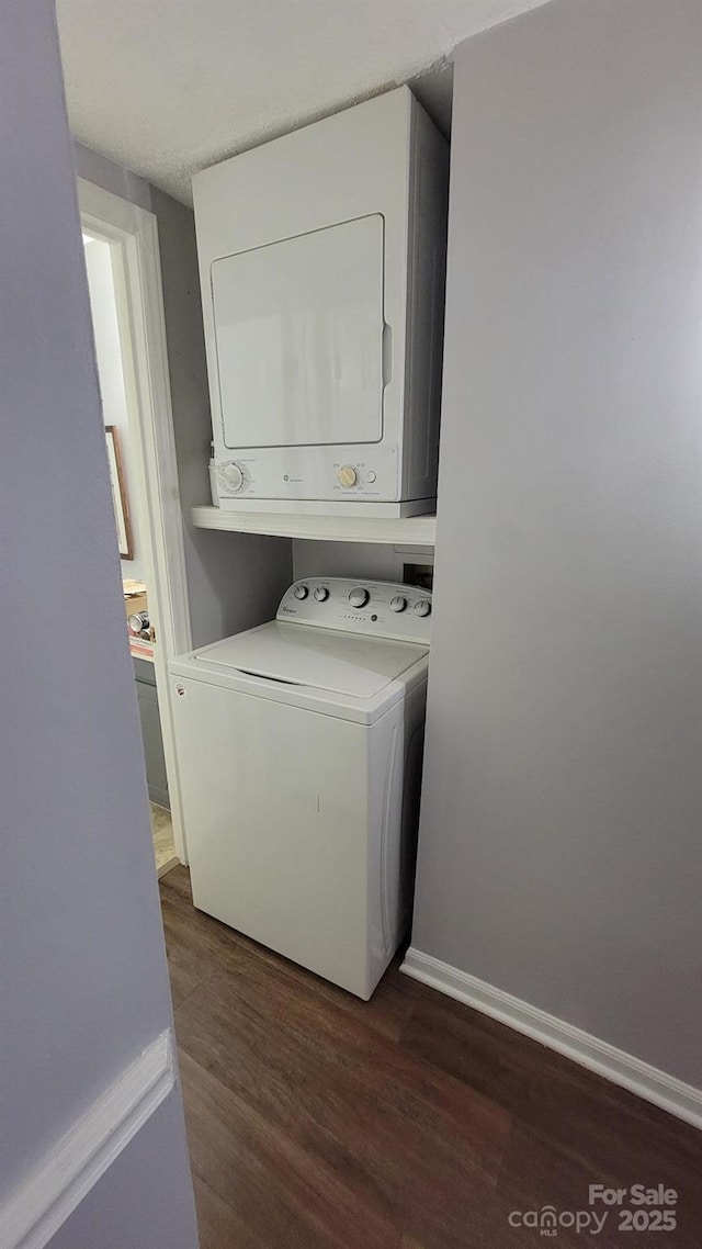 2116 S Main St, Kannapolis, NC 28081 - laundry room featuring stacked washing machine and dryer and dark wood finished floors