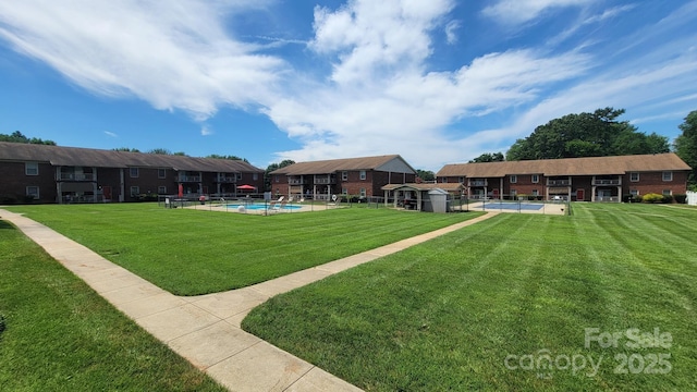 2116 S Main St, Kannapolis, NC 28081 - view of green lawn with a community pool