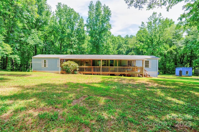 121 Whipporwill Ct, Grover, NC 28073 - view of front facade with a front yard and a storage unit