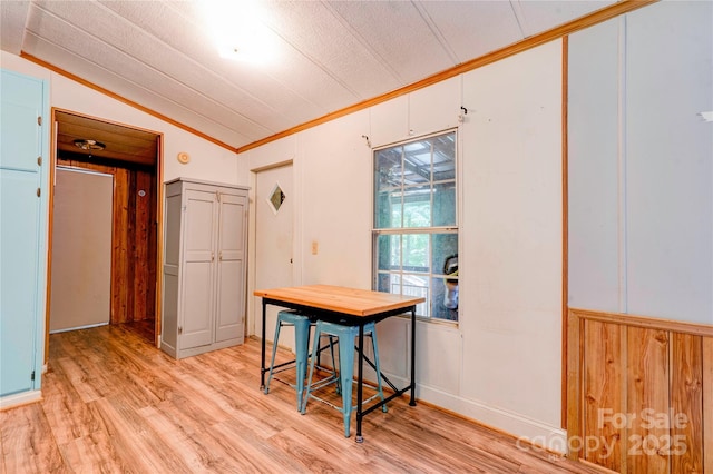 121 Whipporwill Ct, Grover, NC 28073 - dining space featuring crown molding, vaulted ceiling, and light wood-style flooring