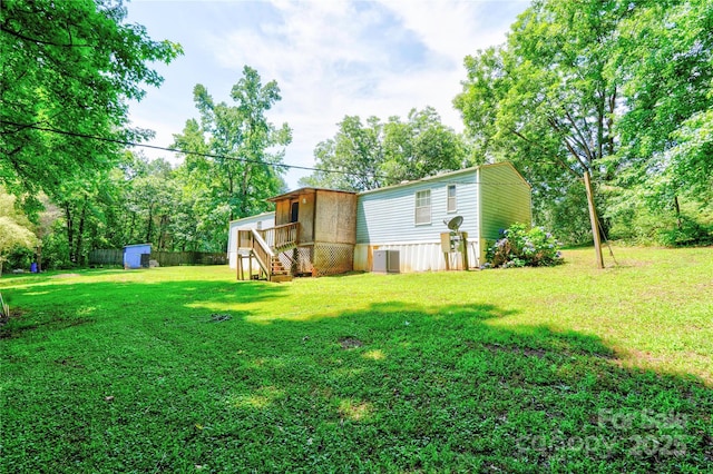 121 Whipporwill Ct, Grover, NC 28073 - view of grassy yard featuring a storage shed and stairway