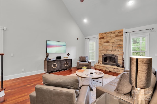 4552 Sawgrass Ct, Denver, NC 28037 - living room featuring high vaulted ceiling, wood finished floors, a fireplace, a ceiling fan, and recessed lighting
