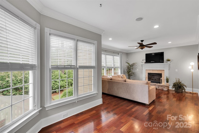 4552 Sawgrass Ct, Denver, NC 28037 - living room with ornamental molding, a stone fireplace, ceiling fan, dark wood finished floors, and recessed lighting