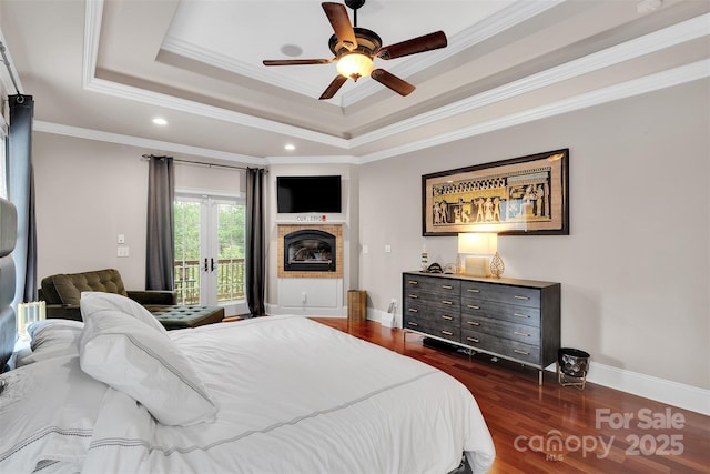 4552 Sawgrass Ct, Denver, NC 28037 - bedroom featuring a tray ceiling, access to outside, dark wood-style flooring, crown molding, and recessed lighting