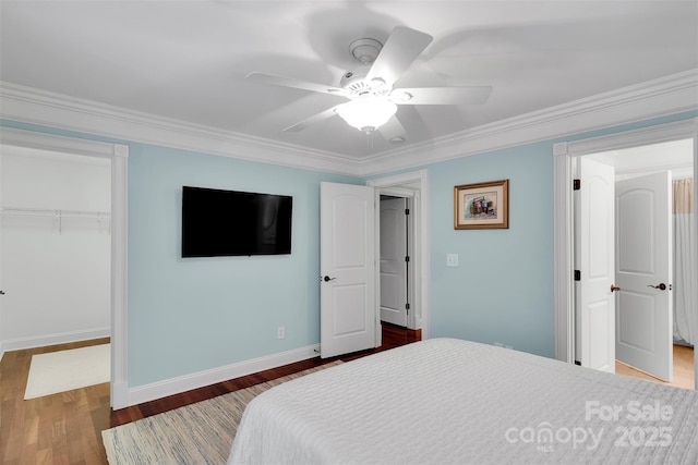 4552 Sawgrass Ct, Denver, NC 28037 - bedroom featuring a closet, wood finished floors, ceiling fan, and ornamental molding