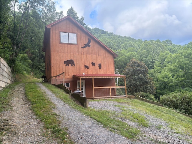 39 Moondust Dr, Waynesville, NC 28786 - view of home's exterior featuring a wooded view