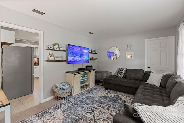10108 Starwood Dr Unit 13, Charlotte, NC 28215 - living area featuring light colored carpet and light tile patterned floors