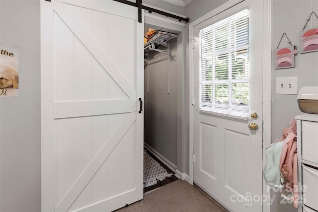 10108 Starwood Dr Unit 13, Charlotte, NC 28215 - doorway to outside featuring a barn door and light colored carpet