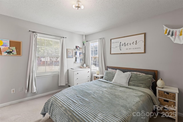 10108 Starwood Dr Unit 13, Charlotte, NC 28215 - bedroom featuring carpet flooring and a textured ceiling