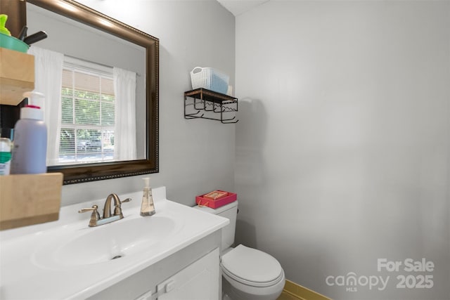 10108 Starwood Dr Unit 13, Charlotte, NC 28215 - half bathroom featuring toilet and vanity