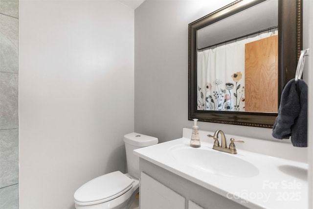 10108 Starwood Dr Unit 13, Charlotte, NC 28215 - bathroom featuring vanity and toilet