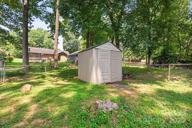 10108 Starwood Dr Unit 13, Charlotte, NC 28215 - fenced backyard with a storage shed