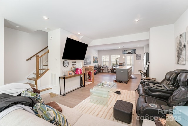 334 Chattooga Way, Charlotte, NC 28211 - living room with light wood finished floors, stairs, and recessed lighting