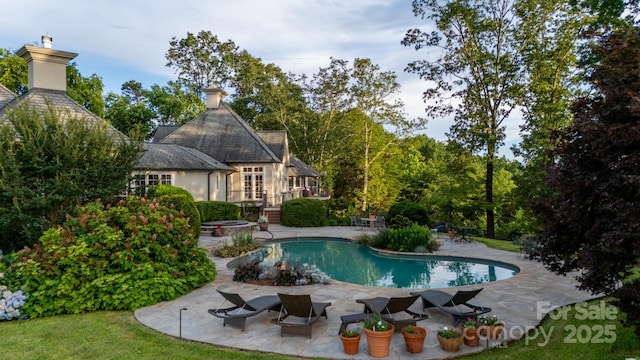 650 Golf Course Rd, Columbus, NC 28722 - swimming pool featuring a patio and an outdoor fire pit