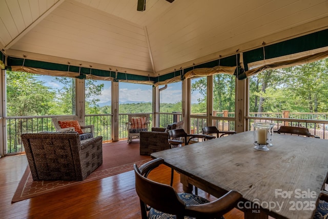 650 Golf Course Rd, Columbus, NC 28722 - sunroom featuring outdoor dining space, vaulted ceiling, and an outdoor hangout area