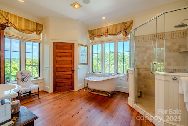 650 Golf Course Rd, Columbus, NC 28722 - full bath featuring healthy amount of natural light, a freestanding tub, a stall shower, wood-type flooring, and ornamental molding