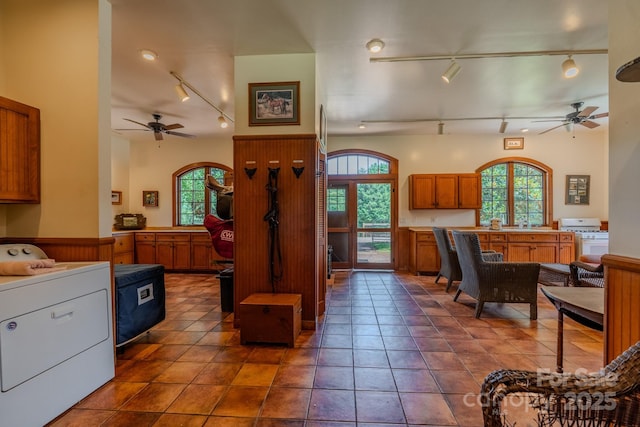 650 Golf Course Rd, Columbus, NC 28722 - kitchen with track lighting, ceiling fan, washer / clothes dryer, and white gas range
