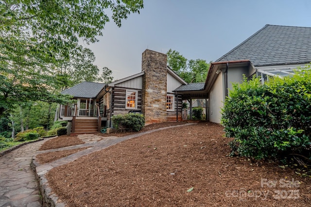 650 Golf Course Rd, Columbus, NC 28722 - back of house with a chimney, a wooden deck, and stairs