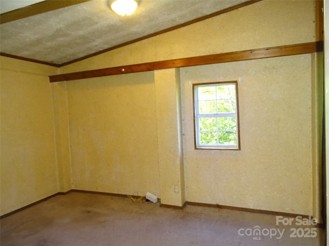 113 Dillon St, Winston Salem, NC 27107 - spare room with ornamental molding, carpet flooring, and lofted ceiling