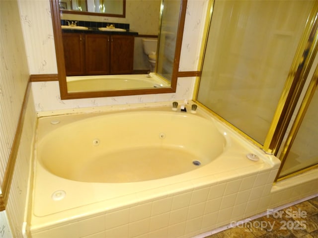 113 Dillon St, Winston Salem, NC 27107 - bathroom featuring wallpapered walls, a jetted tub, double vanity, and a shower stall
