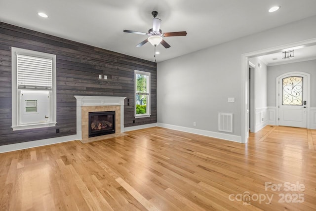 4930 Killian Crossing Dr, Denver, NC 28037 - unfurnished living room with a ceiling fan, a fireplace with flush hearth, light wood finished floors, and recessed lighting