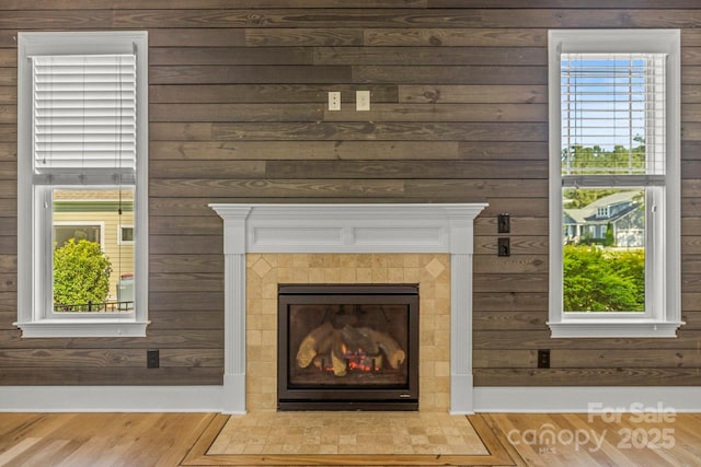 4930 Killian Crossing Dr, Denver, NC 28037 - detailed view of wood finished floors, wooden walls, and a tiled fireplace