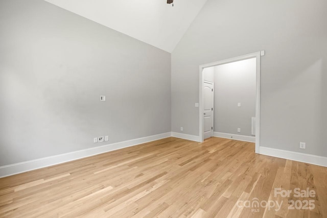 4930 Killian Crossing Dr, Denver, NC 28037 - empty room with high vaulted ceiling and light wood-style flooring