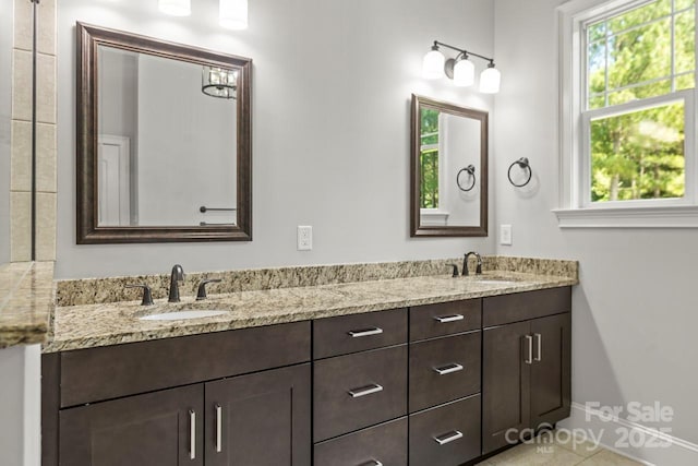 4930 Killian Crossing Dr, Denver, NC 28037 - full bath featuring healthy amount of natural light, double vanity, and tile patterned flooring