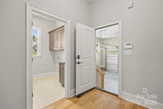 4930 Killian Crossing Dr, Denver, NC 28037 - foyer featuring healthy amount of natural light and light tile patterned floors